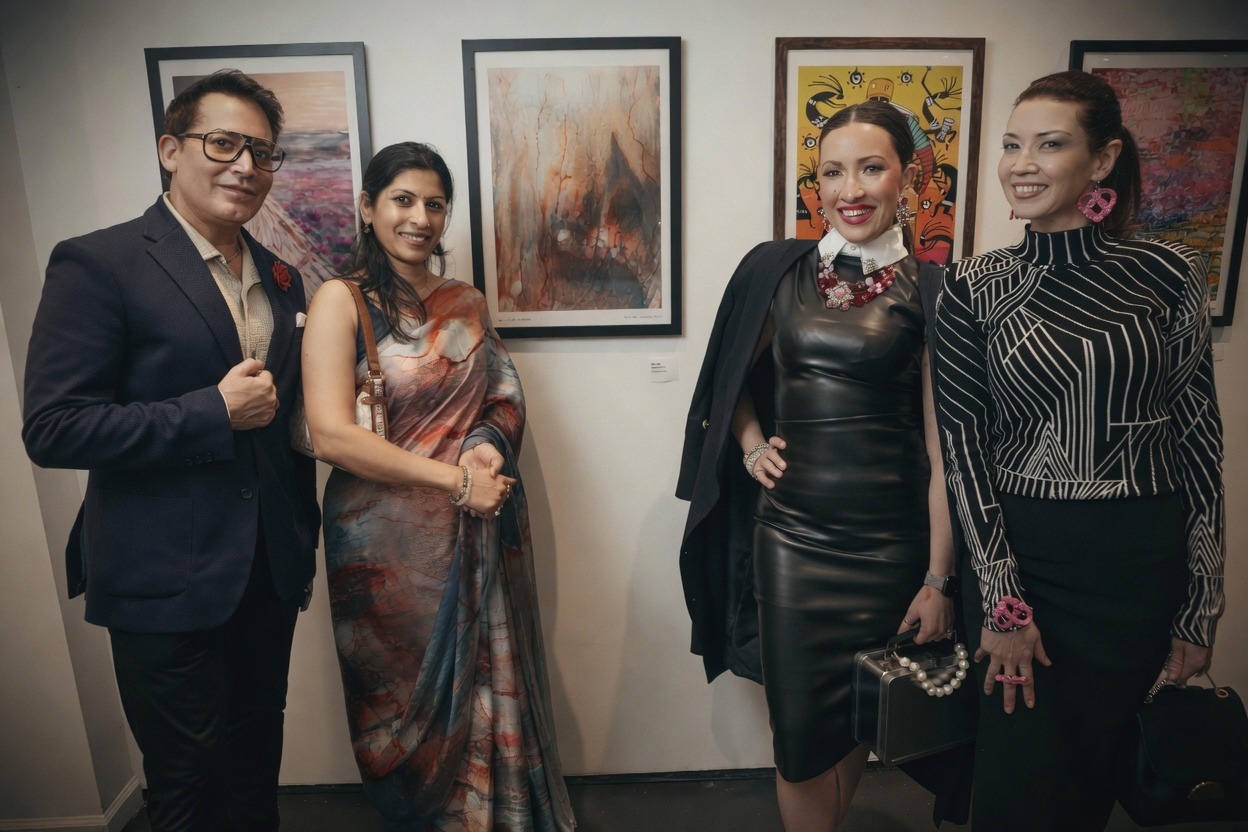 Visitors and artwork at the New York exhibition