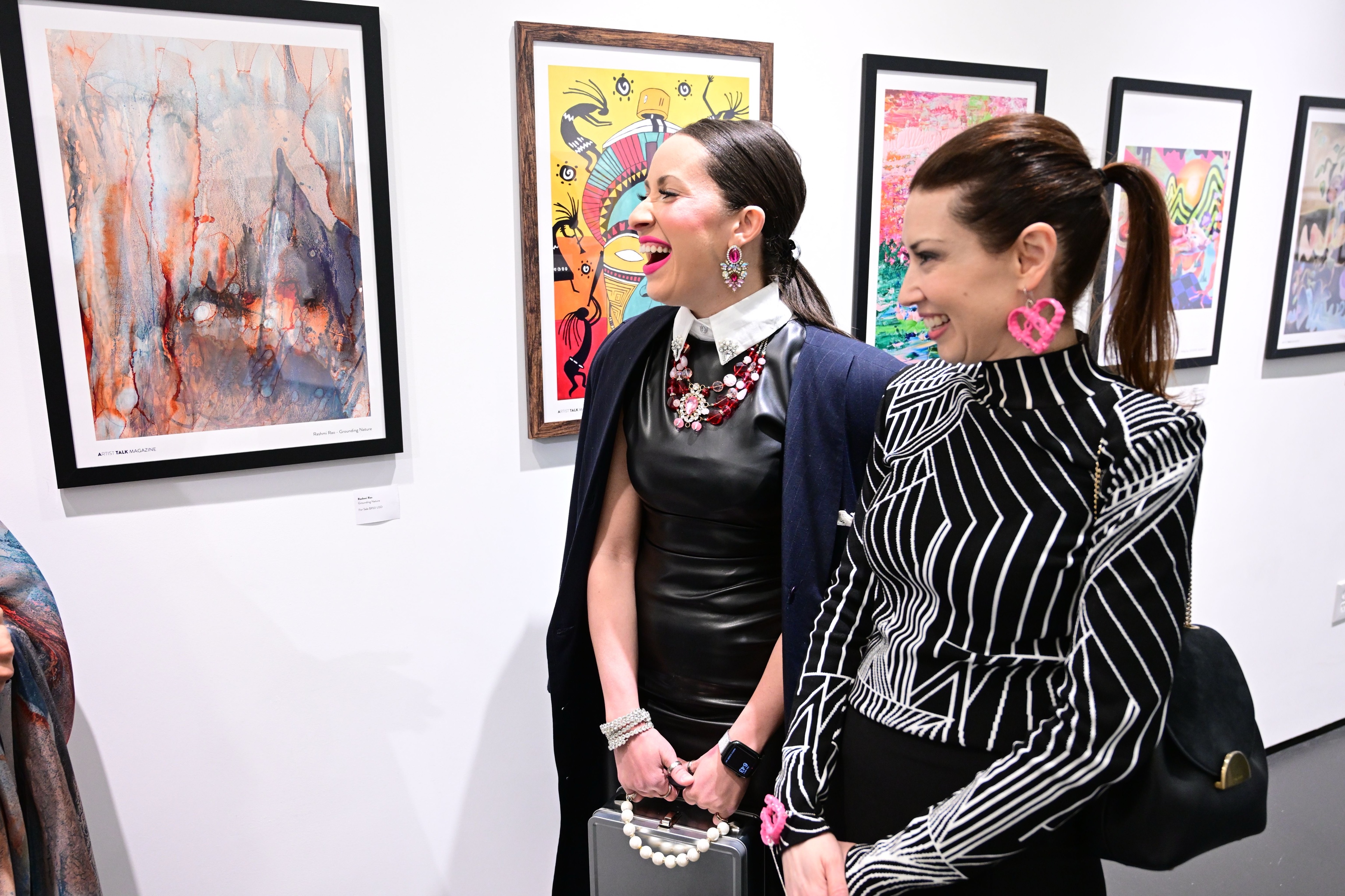 Artwork and visitors at the exhibition