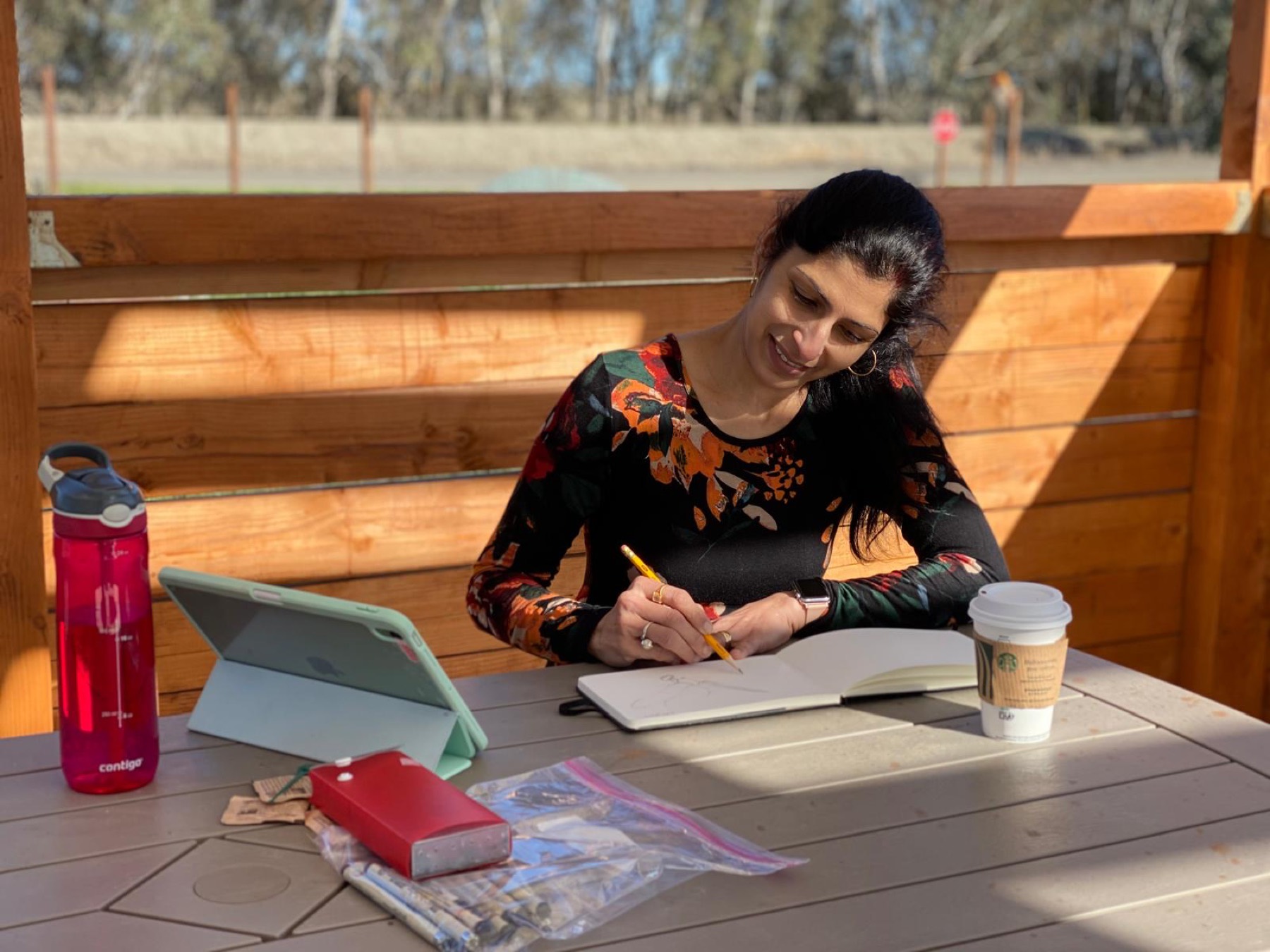 Rashmi sketching outdoors